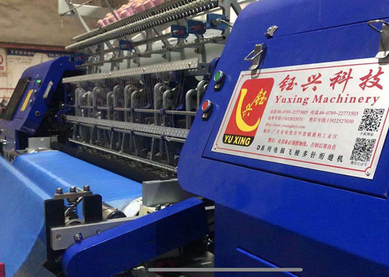 La máquina de colchas industriales produce colchas blancas y blancas blanco y azul MAX 240m/h