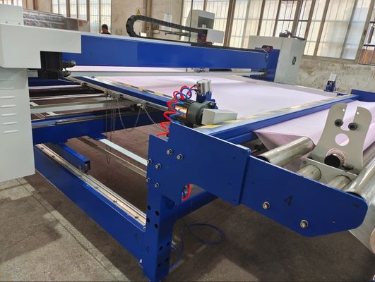 Máquina para cubrir con una sola cabeza de tipo industrial continuo para grandes patrones